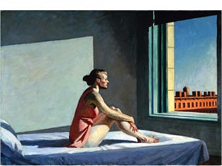 donna seduta sul letto che guarda la finestra
